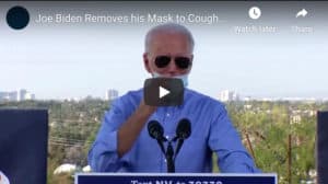 Joe Biden removes mask to cough into his hand